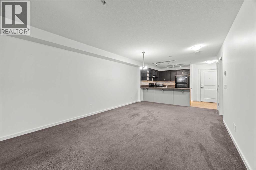 #1213, 310 McKenzie Towne Gate SE - Photo 11