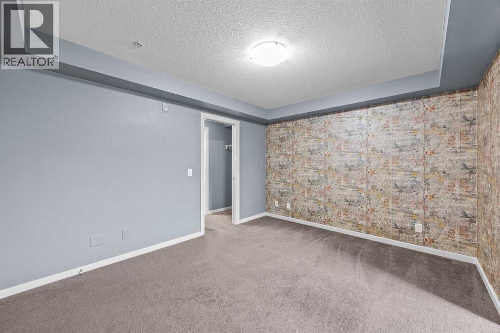 #1213, 310 McKenzie Towne Gate SE - Photo 17